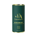 Green cylindrical container with gold lid labeled 'PanchAura SoberSure' on a white background